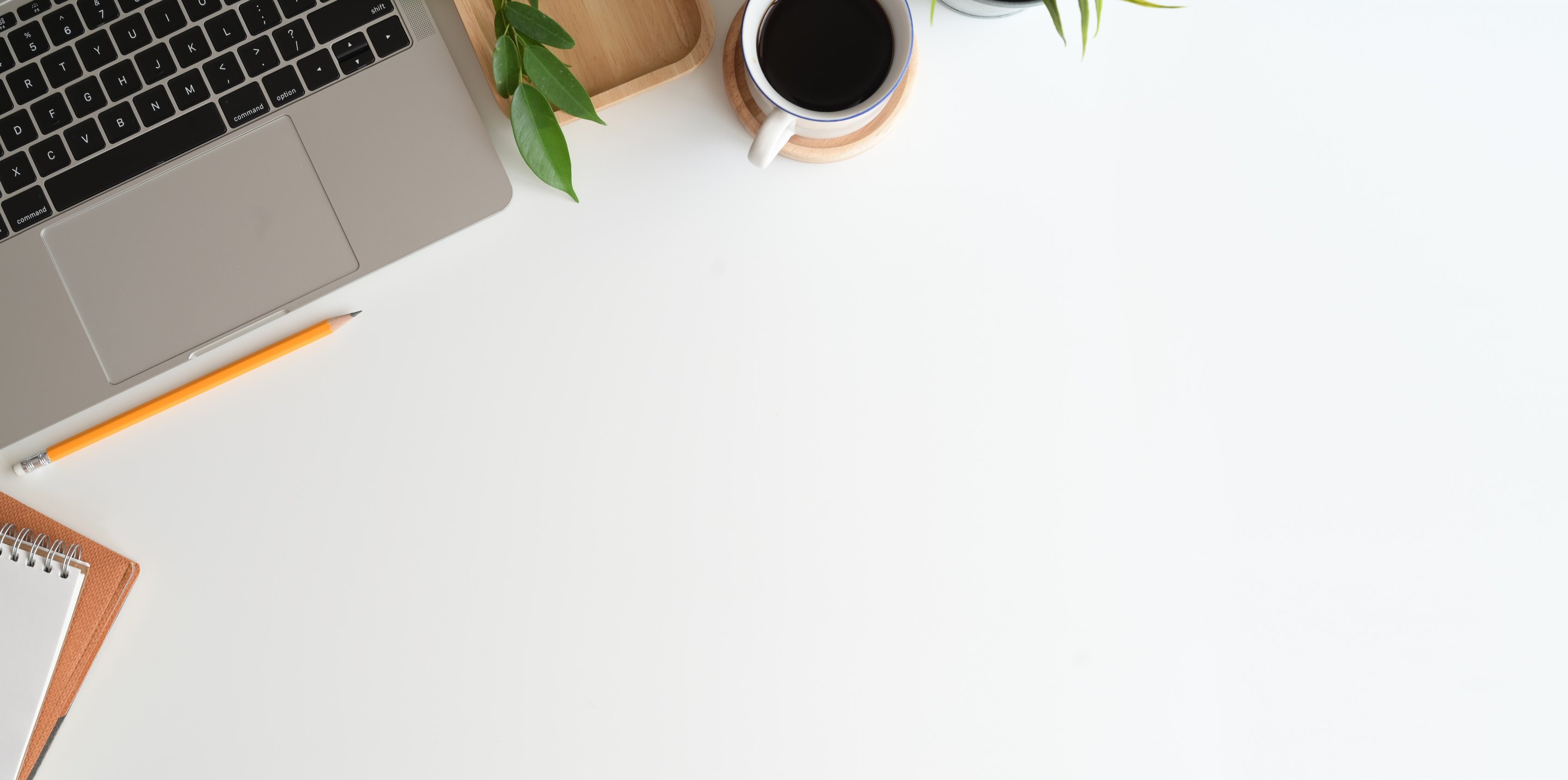 White Ceramic Mug on White Table